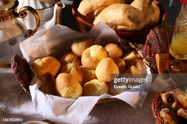 breakfast with traditional brazilian cheese bread. - pão de queijo stock pictures, royalty-free photos & images