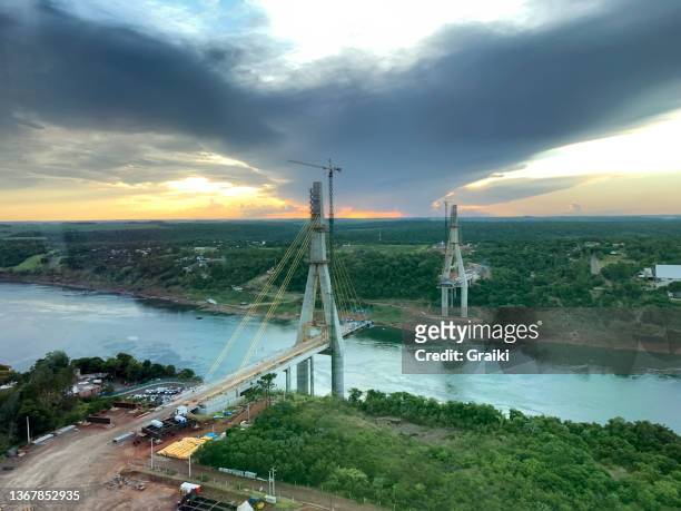integration bridge between brazil and paraguay in construction - paraná stock pictures, royalty-free photos & images