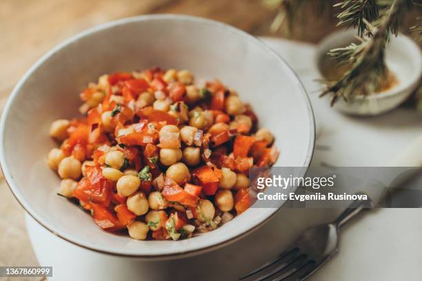 chickpea salad with tomatoes - chick pea salad stock pictures, royalty-free photos & images