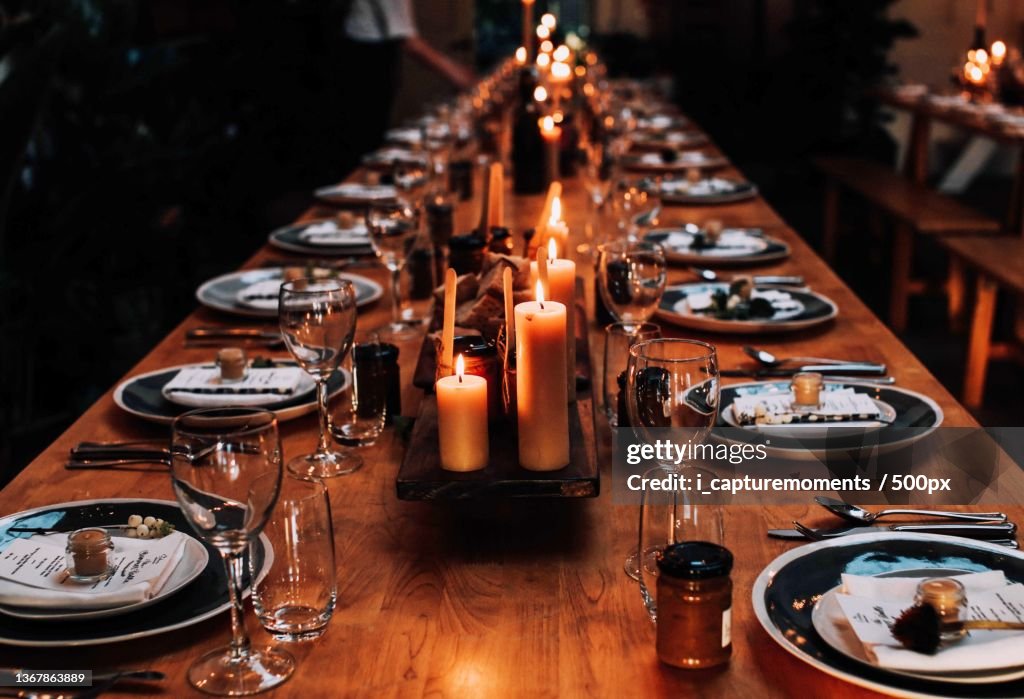 Evening well spent,High angle view of lit candles on dining table
