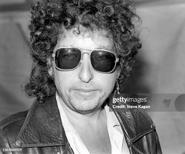 Close-up of American Folk and Pop musician Bob Dylan backstage at the debut Farm Aid benefit festival, Champaign, Illinois, September 22, 1985.