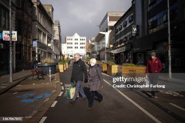 People walk through Wolverhampton city centre which is earmarked to benefit from the first 'Levelling Up' funds provided by the government on January...