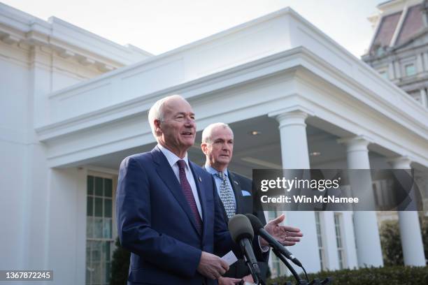 Arkansas Gov. Asa Hutchinson , Chairman of the National Governors Association, and New Jersey Gov. Phil Murphy speak outside the White House after a...