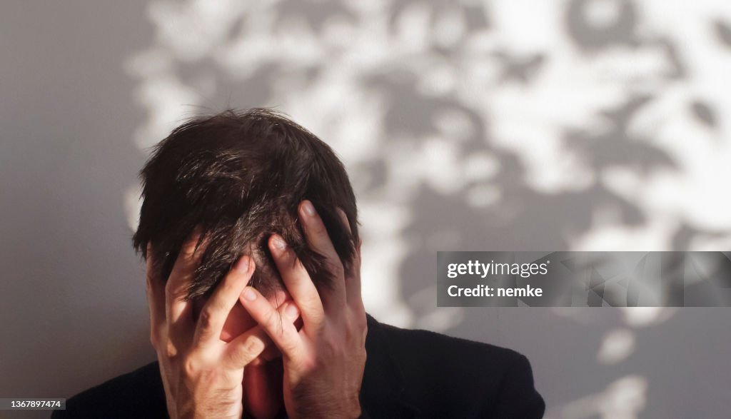 Troubled man suffering mental illness