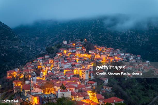 dimitsana village in the peloponnese, greece during blue hour - arcadia greece stock pictures, royalty-free photos & images