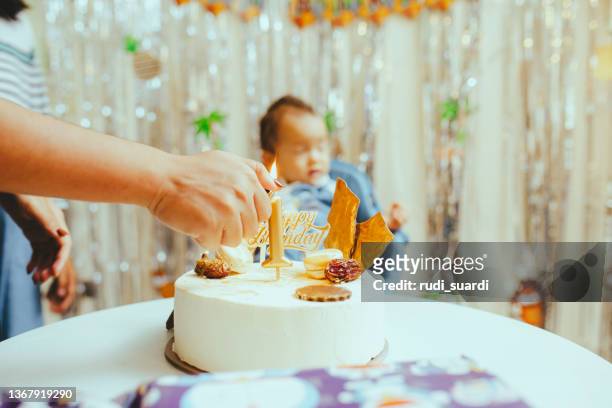 happy family at birthday party - 1st birthday cake stock pictures, royalty-free photos & images