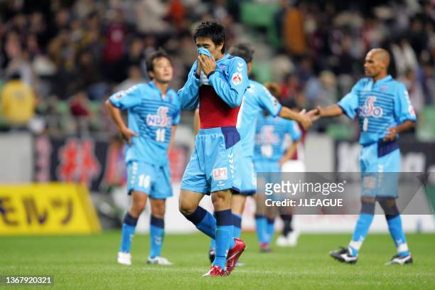 Oh Beom-Seok of Yokohama FC shows dejection after his side's 0-3 defeat confirming the relegation to the J2 following the J.League J1 match between...