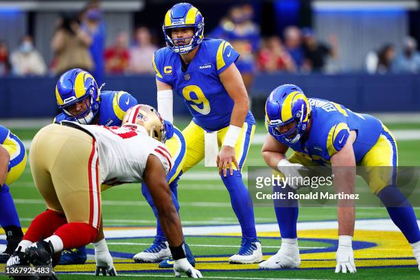 Matthew Stafford of the Los Angeles Rams calls a play in the NFC Championship Game against the San Francisco 49ers at SoFi Stadium on January 30,...