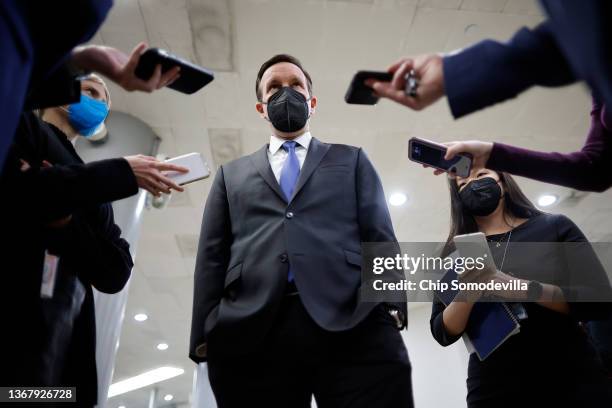 Sen. Chris Murphy talks to reporters as he arrives at the Capitol for a vote on January 31, 2022 in Washington, DC. Congress is returning from a...