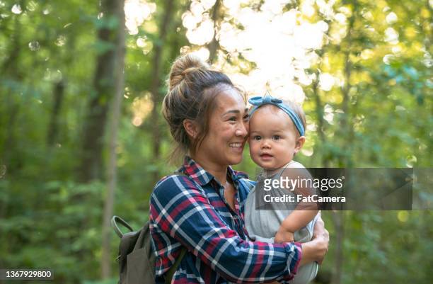 mother and daughter on a hike - vitality leaf stock pictures, royalty-free photos & images