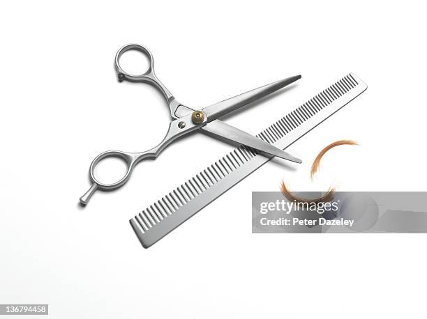 hairdresser scissors and comb on white background - forbici per parrucchieri foto e immagini stock