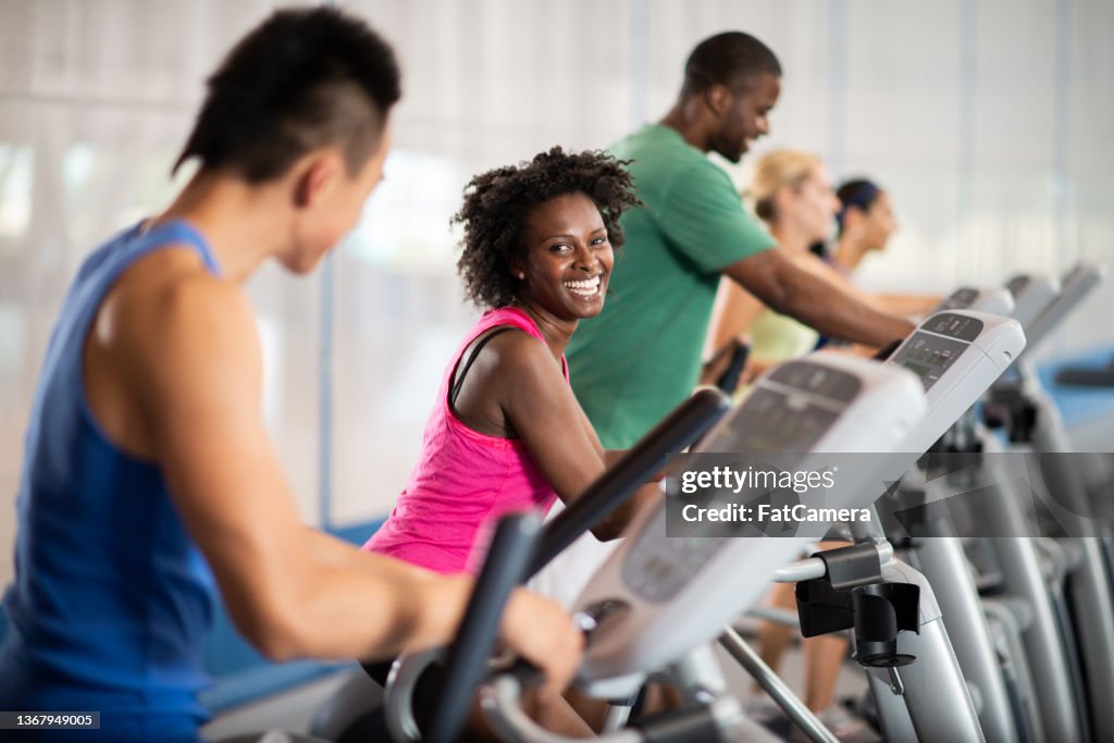 Working Out Example Woman Working Out On A Treadmill High-Res Stock Photo - Getty Images