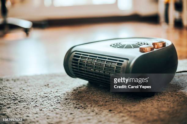 electric heather at home - electric heater stock pictures, royalty-free photos & images