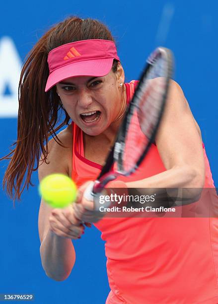 Sorana Cirstea of Romania returns a shot to Angelique Kerber of Germany during day five of the 2012 Hobart International at Domain Tennis Centre on...