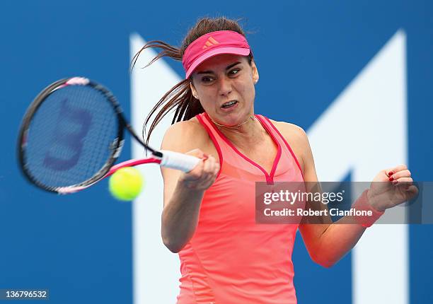 Sorana Cirstea of Romania returns a shot to Angelique Kerber of Germany during day five of the 2012 Hobart International at Domain Tennis Centre on...