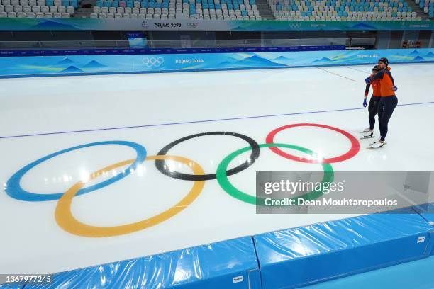 Femke Kok and Kjeld Nuis of Team Netherlands hug during a speed skating practice session ahead of the Beijing 2022 Winter Olympic Games at National...