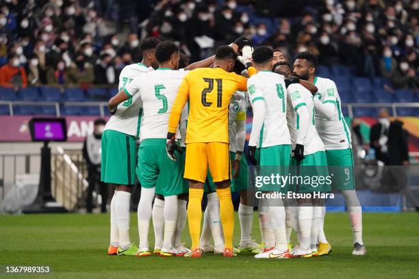 Saudi Arabia players huddle prior to the FIFA World Cup Asian Qualifier Final Round Group B match between Japan and Saudi Arabia at Saitama Stadium...