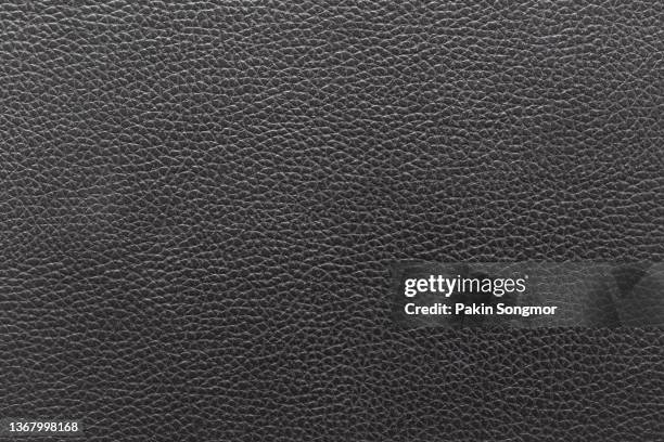 close-up of black leather and texture background. - rindsleder stock-fotos und bilder