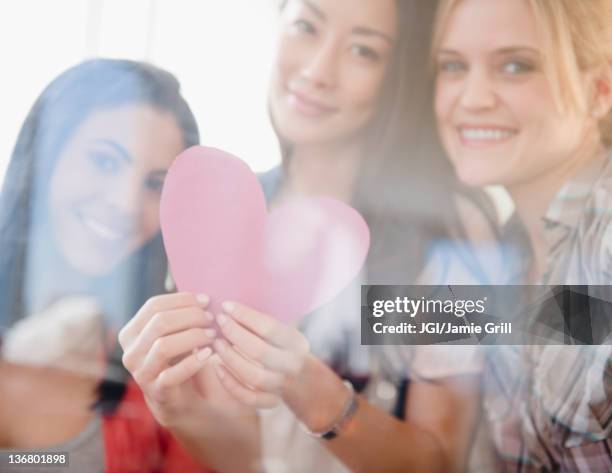 friends holding valentine - バレンタイン　友人 ストックフォトと画像