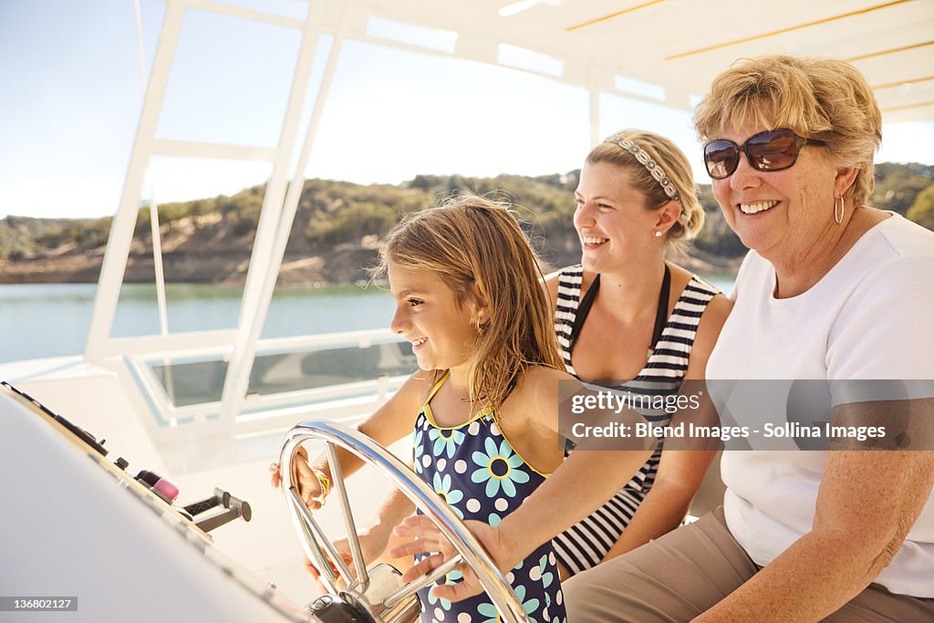 Family enjoying boat on lake