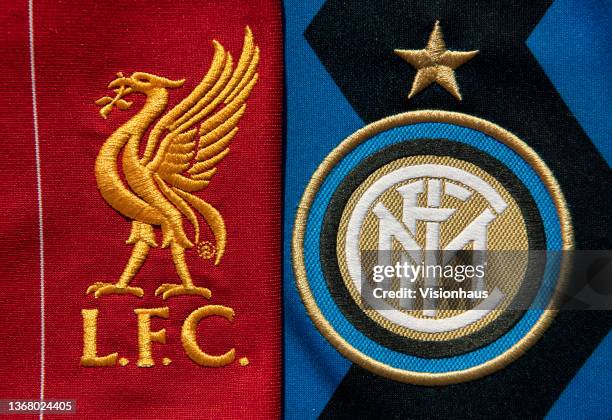 The Liverpool and Inter Milan club badges on their shirts ahead of their UEFA Champions League Round of 16 first leg match on February 1, 2021 in...