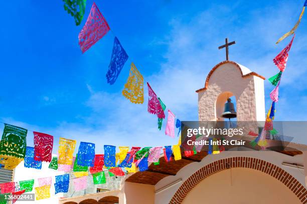 colorful flags decorating church - nayarit stock pictures, royalty-free photos & images