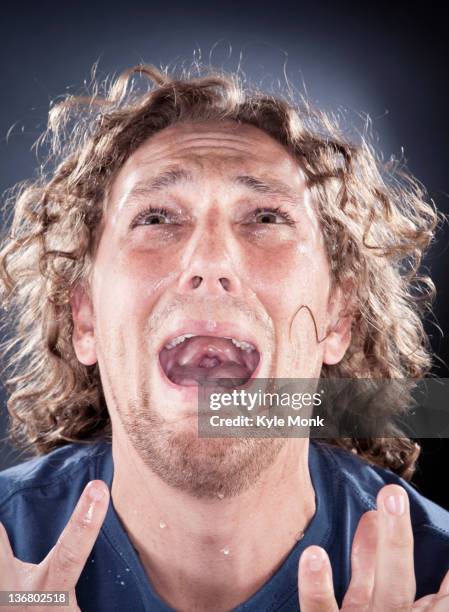 caucasian man looking up and shouting - shouting face stock pictures, royalty-free photos & images