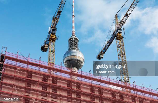 construction site next to berlin television tower - television tower berlin stock-fotos und bilder