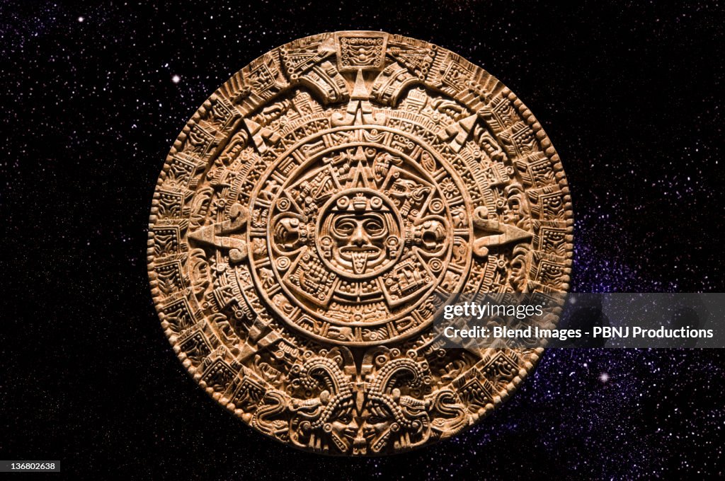 Aztec calendar stone carving in space