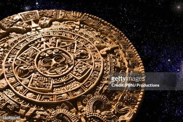 aztec calendar stone carving in space - calendario azteca foto e immagini stock