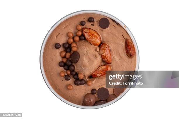 top view of chocolate gelato with almonds and chocolate drops in jar isolated on white - chocolate top view stockfoto's en -beelden