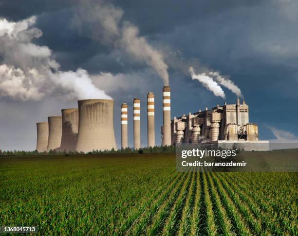 coal power plant and environmental pollution - pollution stock pictures, royalty-free photos & images