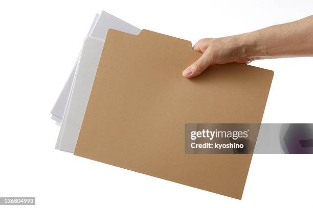 isolated shot of holding a file folder against white background - folders stock pictures, royalty-free photos & images