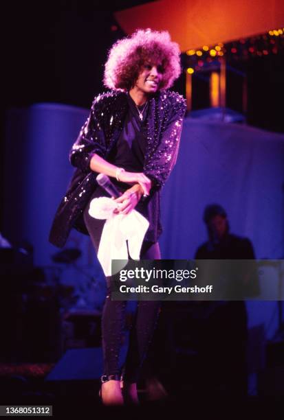 American Pop and R&B singer Whitney Houston performs onstage at Jones Beach Theatre, Wantagh, New York, August 2, 1986.