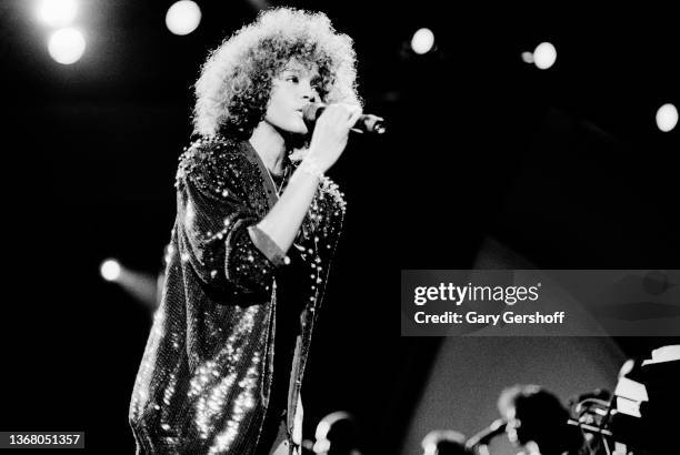 American Pop and R&B singer Whitney Houston performs onstage at Jones Beach Theatre, Wantagh, New York, August 2, 1986.