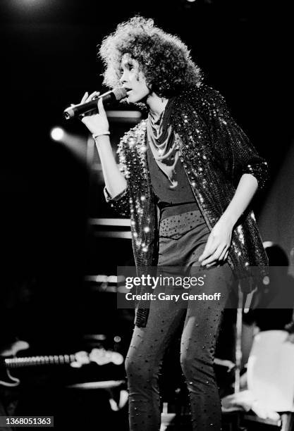 American Pop and R&B singer Whitney Houston performs onstage at Jones Beach Theatre, Wantagh, New York, August 2, 1986.