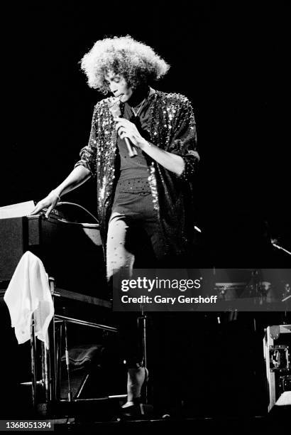 American Pop and R&B singer Whitney Houston performs onstage at Jones Beach Theatre, Wantagh, New York, August 2, 1986.