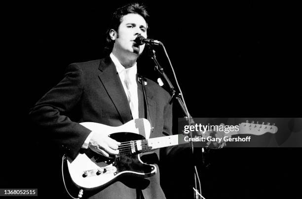 View of American Country musician Vince Gill plays guitar, as he performs onstage at the Beacon Theatre, New York, New York, May 15, 1991.