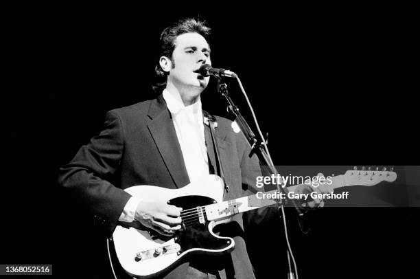 View of American Country musician Vince Gill plays guitar, as he performs onstage at the Beacon Theatre, New York, New York, May 15, 1991.