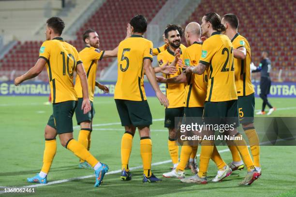 Aaron Mooy of Australia celebrates with teammates after scoring their team's second goal during the FIFA World Cup Qatar 2022 Qualifier match between...