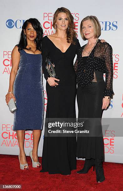 Actresses Penny Johnson, Stana Katic and Susan Sullivan pose in the press room during the People's Choice Awards 2012 at Nokia Theatre LA Live on...