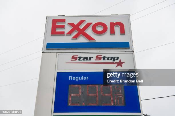 Projection of ExxonMobil gas prices are seen on February 01, 2022 in Houston, Texas. The energy giant announced on Monday that it will be relocating...