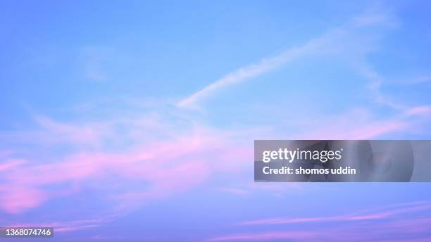 panoramic view of pink and blue sky at sunset - blue hour imagens e fotografias de stock