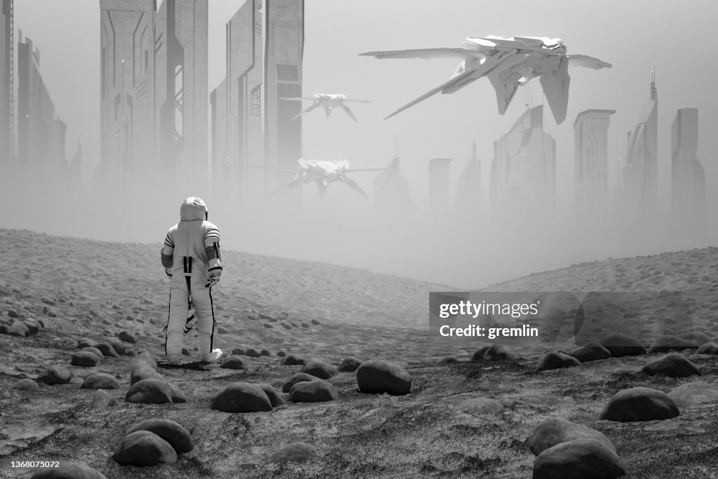 Astronaut walking on distant planet