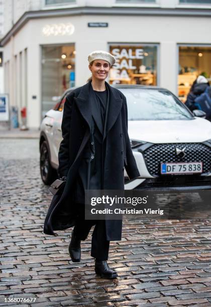 Cecilie Thorsmark seen wearing beret, black coat outside Iso.Poetism by Tobias Birk during Copenhagen Fashion Week Autumn/Winter 2022 on February 01,...