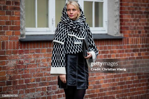 Andrea Steen seen wearing black white hooded jumper, black skirt outside Gestuz during Copenhagen Fashion Week Autumn/Winter 2022 on February 01,...