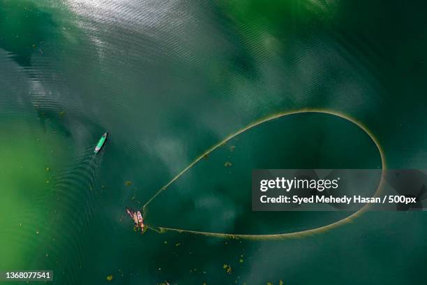 aerial view of fishing at rangamati lake,bangladesh - bangladesh aerial stock pictures, royalty-free photos & images