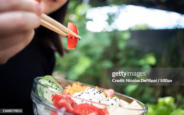 comida sana,midsection of woman eating food,argentina - comida sana stock pictures, royalty-free photos & images