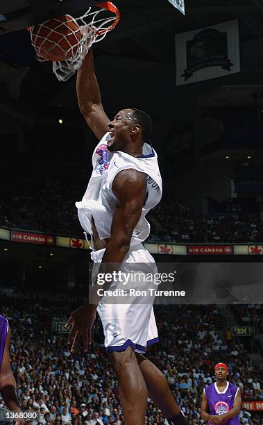 Alonzo Mourning of the Miami Heat slam dunks during the Vince Carter Charity All Star game at the Air Canada Centre in Toronto, Canada on August 2,...