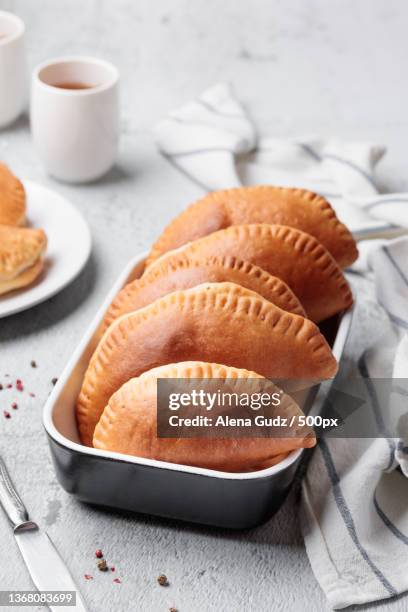 homemade pies,high angle view of sweet food in plate on table - blätterteigpastete stock-fotos und bilder